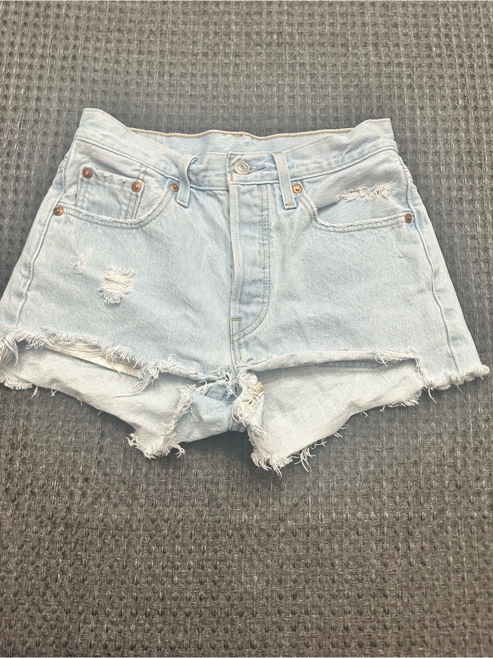 Levi’s 501 distressed cutoff jean shorts. Size 25waist